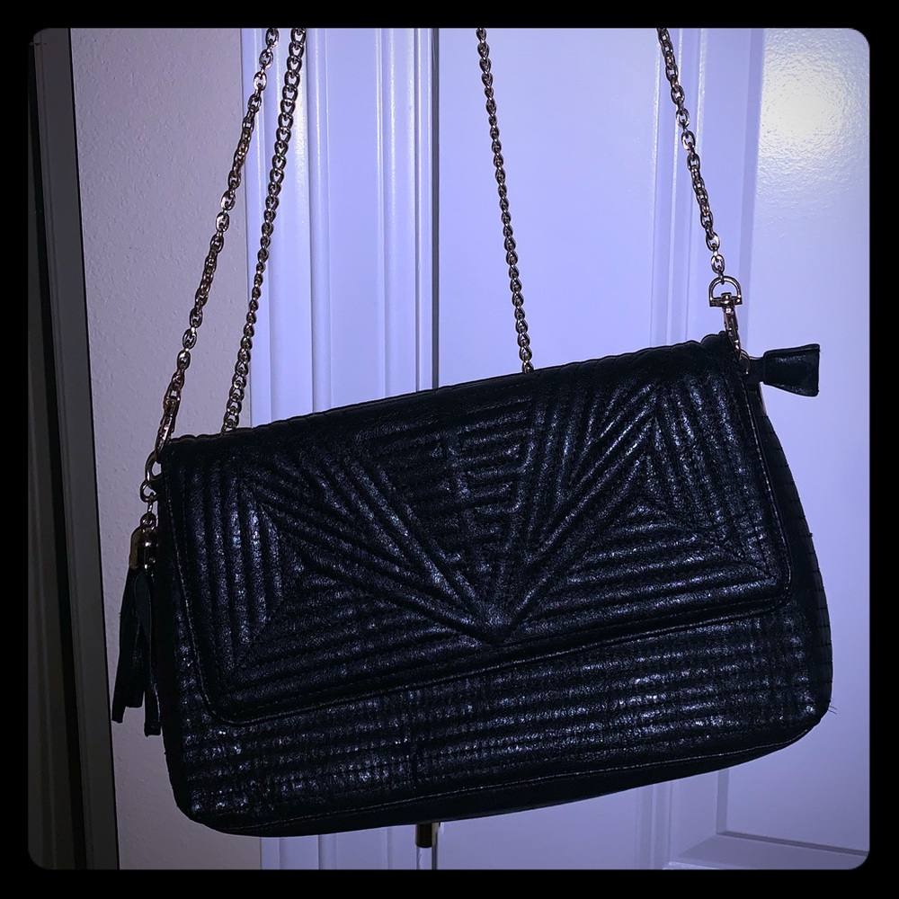 Black crossbody purse with gold chain